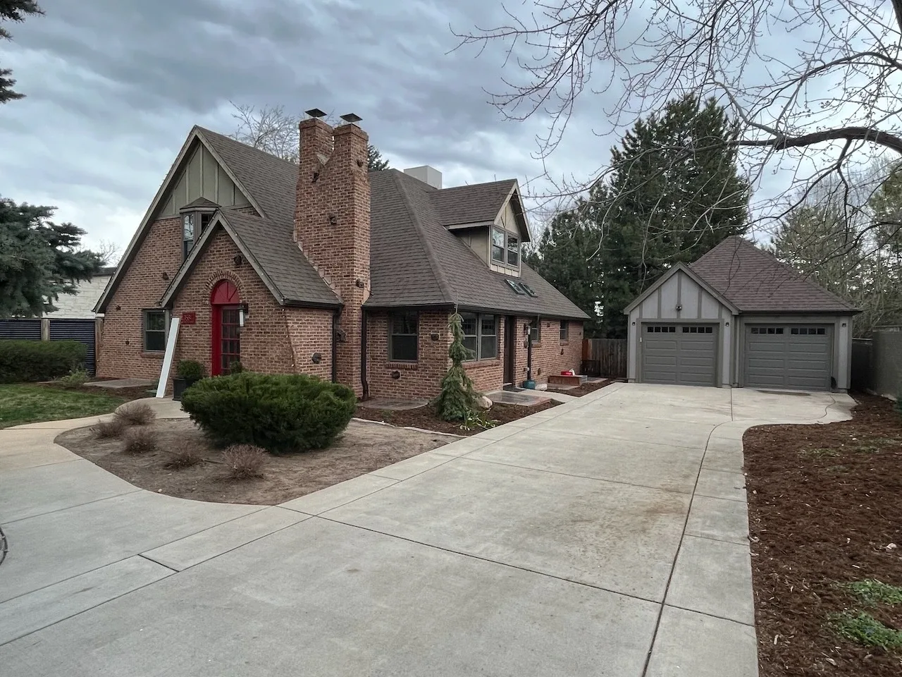 Brick tudor home with clean windows